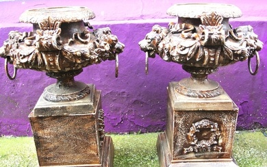 Pair of Victorian style cast iron 'Lion head' garden urns wi...