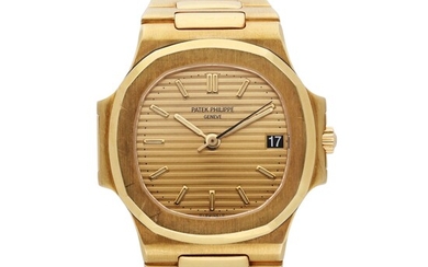 Patek Philippe Reference 3800/1 Nautilus | A yellow gold automatic wristwatch with date and bracelet, Circa 1985