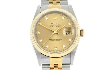 ROLEX - an Oyster Perpetual Datejust bracelet watch. Circa 1994. Stainless steel case with yellow