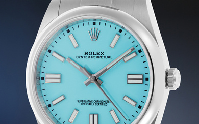 Rolex, Ref. 124300 An attractive and sought-after stainless steel wristwatch with center seconds, turquoise blue lacquer dial, guarantee and presentation box