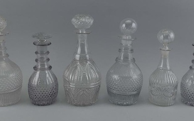 SIX THREE-MOLD CLEAR BLOWN GLASS DECANTERS 19th Century Heights from 8.75” to 10.75”.