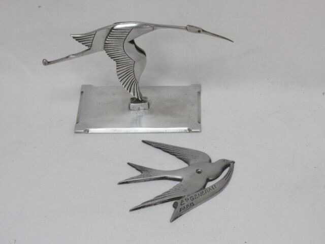 Sculpture en métal blanc figurant un oiseau... - Lot 604 - Enchères Maisons-Laffitte