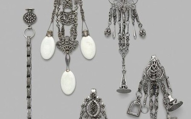Set of four castelaines in silver and openwork...
