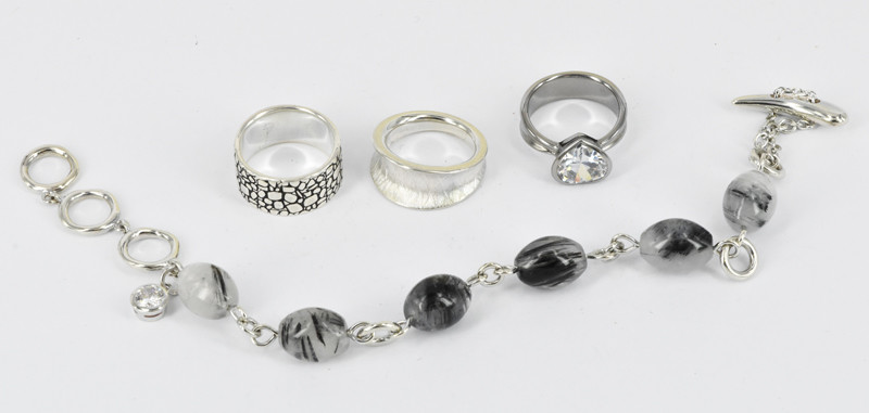 THREE STERLING SILVER RINGS