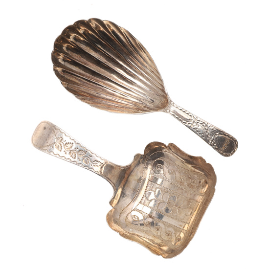 TWO 19TH CENTURY GEORGE III SILVER CADDY SPOONS.