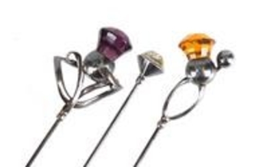 Three Art Nouveau silver hat pins by Charles Horner