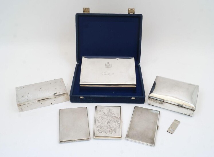 Three Continental cigar boxes and three cigarette cases, comprising: a German cigar box, stamped Sterling 925, by Deyhle, wood lined, the hinged lid engraved with the Coat of Arms of the Hashemite Kingdom of Jordan and facsimile signature...