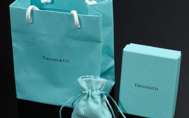 Tiffany & Co silver 925 charm bracelet with 3 pendants "Peace, Heart and Padlock", 45g, l. 17cm, in original bag and box, traces of wear