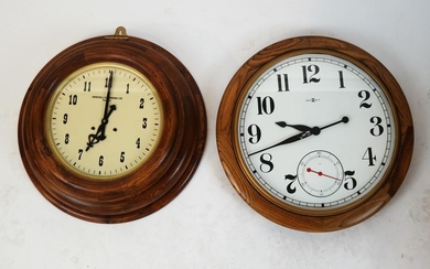 Two Round Oak Wall Clocks