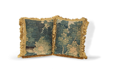 Two cushions of verdure tapestry Early 18th century, probably Aubusson...