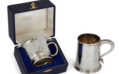 Two silver christening cups by Garrard & Co., the first designed as a small tankard with beaded decoration to handle, the underside with presentation engraving, Brittania silver, Sheffield, c.1973, in cardboard Garrard & Co. box, the second...