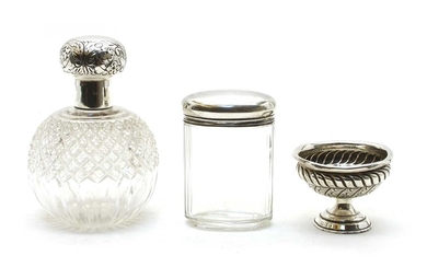 Two silver mounted cut glass dressing table bottles