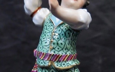 Vintage Porcelain Figurine of a Boy