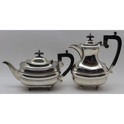 Walker & Hall, A silver teapot and hot water jug, Georgian d...