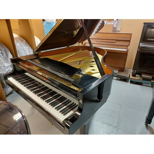 Yamaha (c1991) A 6ft 1in Model C3 grand piano in a bright eb...