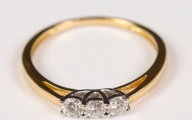 Yellow gold ring (750) decorated with 3 diamonds (for about 0.20 ct). T: 53, Gross weight: 1.72 gr.