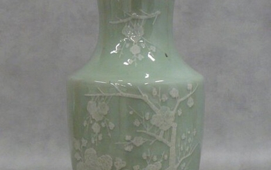 Important celadon porcelain vase with white flowered trees, under a...