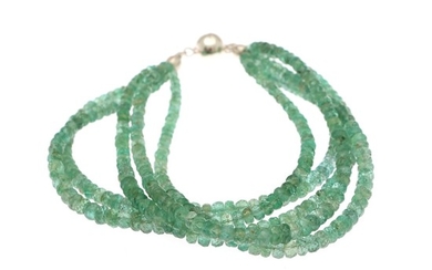 A five string emerald bracelet set with numerous roundel-cut emeralds and magnet clasp of sterling silver. L. 19 cm.