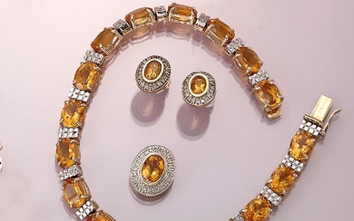 14 kt gold jewelry set with citrines...