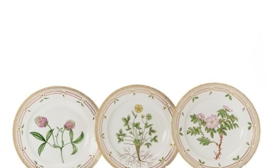 “Flora Danica” three porcelain plates decorated in colours and gold with flowers. 3549. Royal Copenhagen. Diam. 25.5 cm.