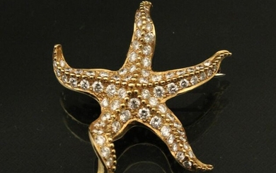 18K YG DIAMOND STAR FISH FORMED BROOCH; APPROX. 1.50