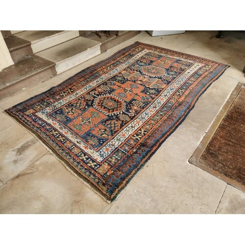 19th. C. hand knotted woolPersian rug { 218cm L X 140cm W }.