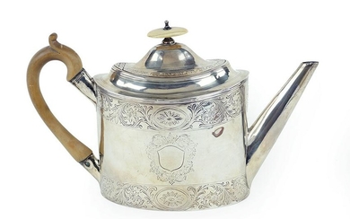 An English George III Silver Teapot.