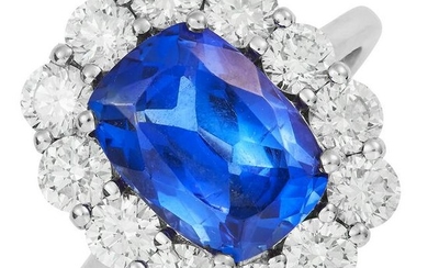 TANZANITE AND DIAMOND CLUSTER RING in 18ct white gold