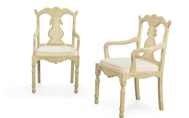 A pair of Anglo-Indian painted hardwood armchairs