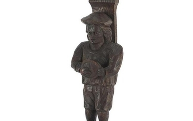 Antique Continental wood carving of a peasant wearing a