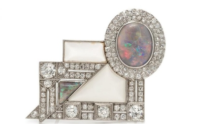 An Art Deco Platinum, Opal, Diamond and Rock Crystal