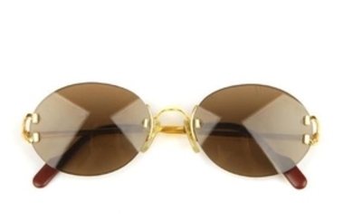 CARTIER - a pair of rimless sunglasses. Featuring oval