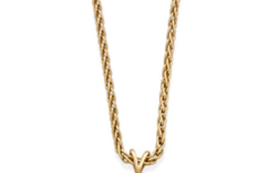 A diamond and gold solitaire pendant on chain