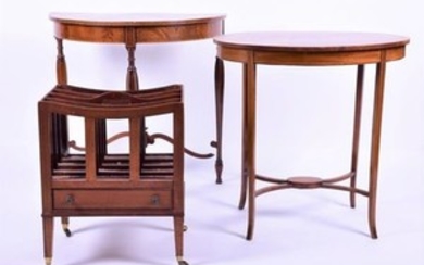 An Edwardian mahogany demi-lune table veneered with flame mahogany and satinwood cross banding, supported on octagonal tapered...