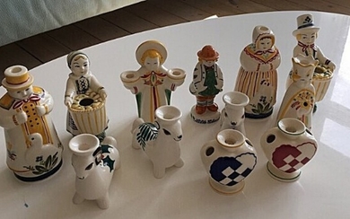 Herluf Jensenius, Nils Thorsson, a.o. : Collection of figures and Christmas candles of faience, decorated in colors. Aluminia, Denmark. H. 8–20 cm. (12)