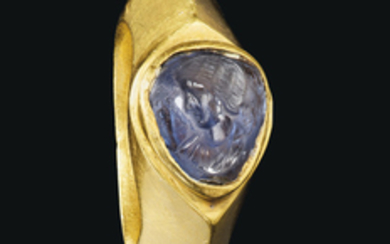 A LATE ROMAN GOLD AND SAPPHIRE FINGER RING WITH A PORTRAIT BUST OF AN IMPERIAL WOMAN, CIRCA EARLY 4TH CENTURY A.D.