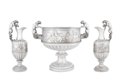 A monumental cased Victorian sterling silver three-piece presentation garniture...