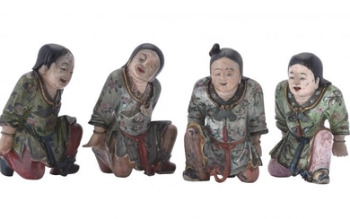 A set of four Chinese painted wood figures