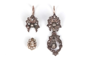 A pair of antique earrings, set with foil-backed...