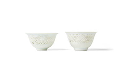 TWO WHITE GLAZED RETICULATED BOWLS