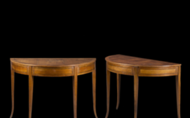 A pair of cherry wood and ebonised wood inlaid demilune consoles. Naples, early 19th century (cm 117x82,5x57,5) (defects)