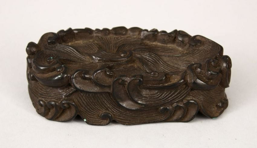 A 19TH CENTURY CHINESE CARVED HARDWOOD WAVE STAND