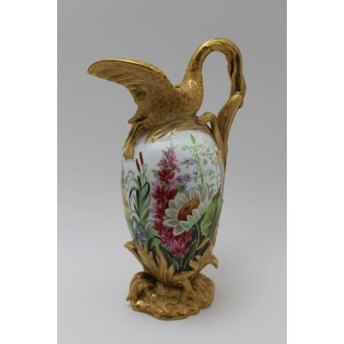 A 19TH CENTURY ENGLISH PORCELAIN JUG, the handle formed by t...
