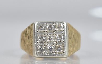 A 9ct Gold and Diamond Ring, Nine Round Brilliant Cut Stones...