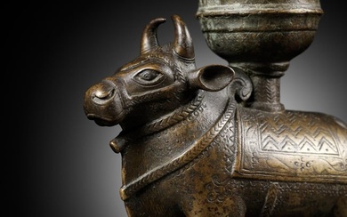 A BRONZE OIL LAMP WITH A FIGURE OF NANDI, SOUTH INDIA, 17TH-18TH CENTURY
