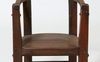 A Baroque style iron mounted oak armchair