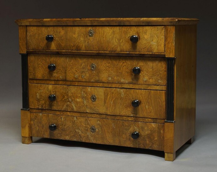 A Biedermeier walnut and ebonised secretaire chest, 19th Century, the...