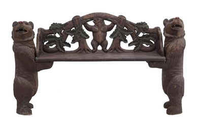 A Black Forest Carved Wood Bench.
