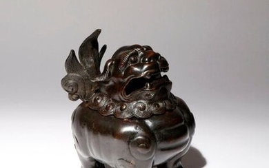 A CHINESE BRONZE 'LION DOG' INCENSE BURNER AND COVER 17TH...