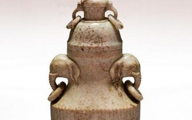 A CHINESE CALCIFIED JADE VASE AND COVER
